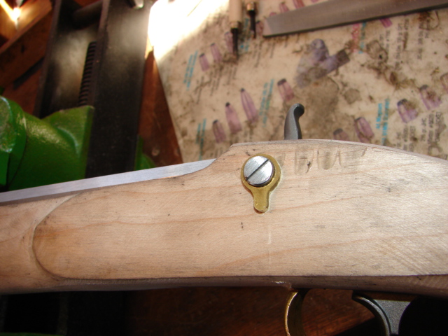 First, taper the edges of your part.  The put it in place and scribe a line around t.